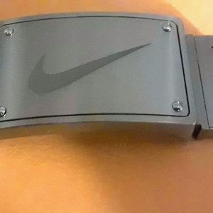 A nice silver Nike belt buckle